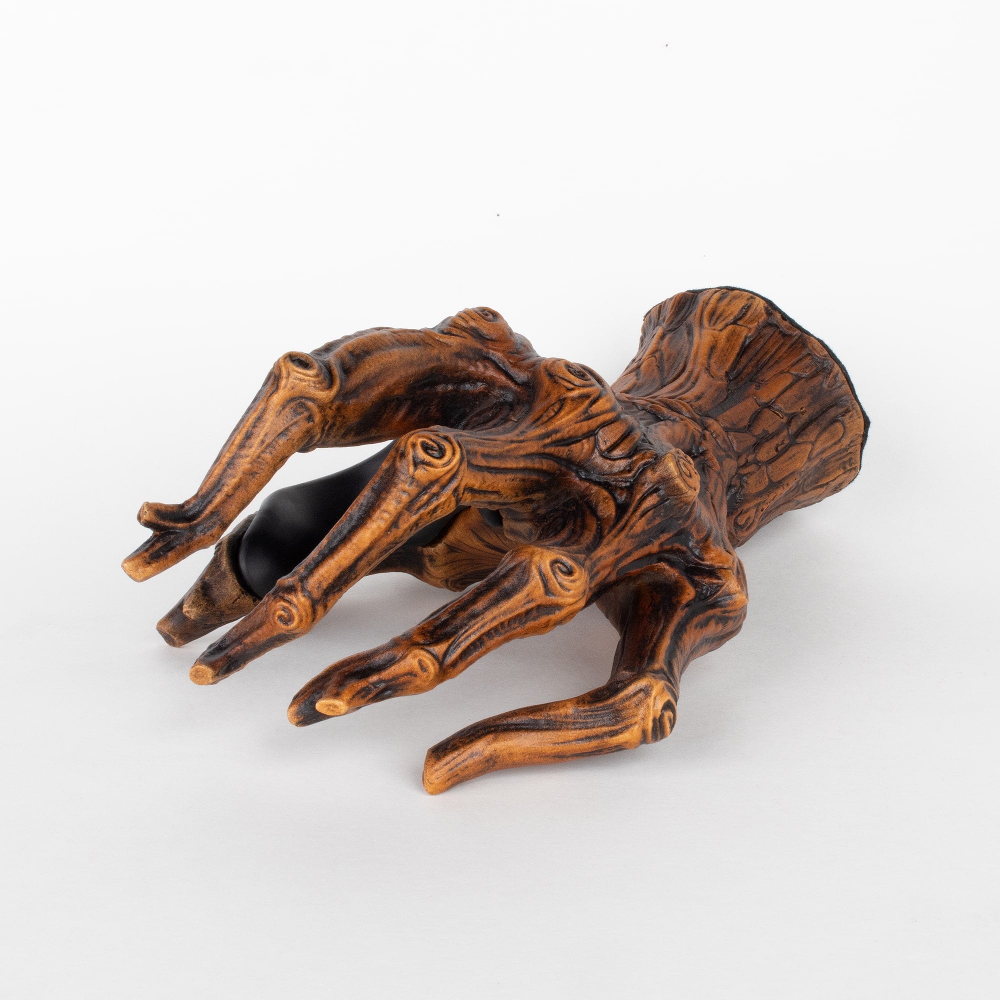 Tree hand guitar hanger wall mount hook top view.
