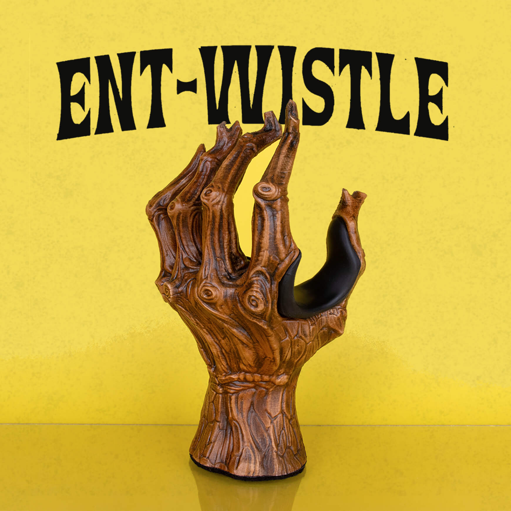 Tree hand guitar hanger wall mount display on yellow background.