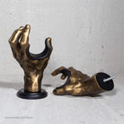 Gold hand shaped guitar hangers pair showing mounting options. 