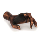Antiqued copper female hand guitar wall hook. Top View. 